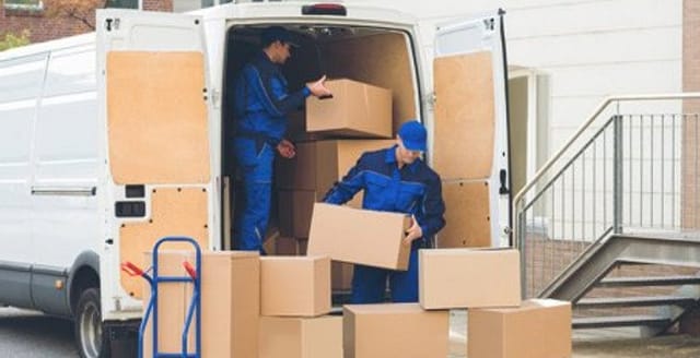 guy holding boxes